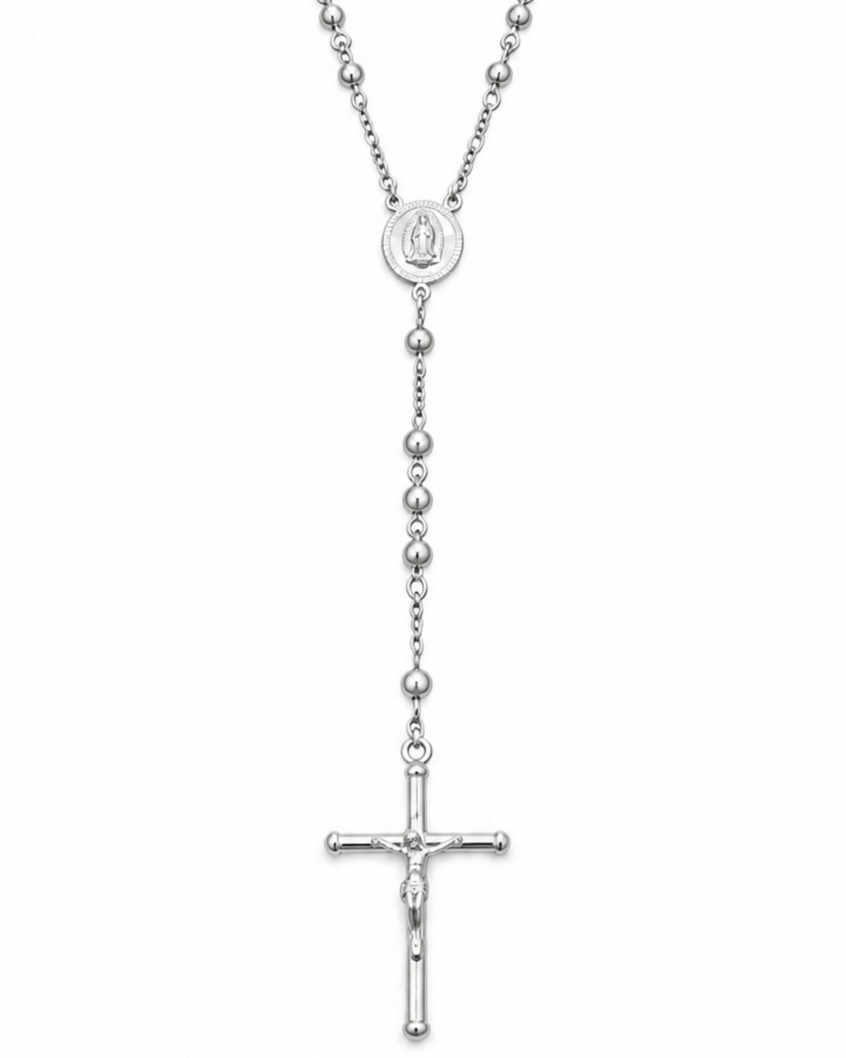 Detalle de la cruz con Cristo y la medalla de la Virgen de Guadalupe en plata .925.